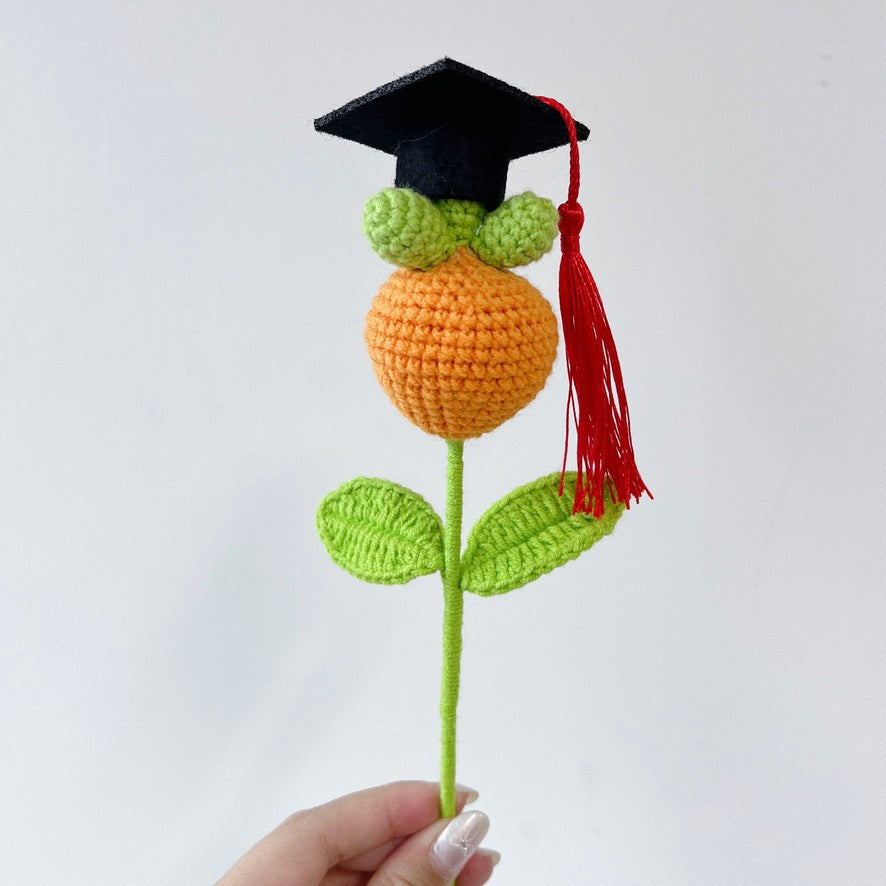 crochet cartoon character animal single stalk flower carrot with mortarboard