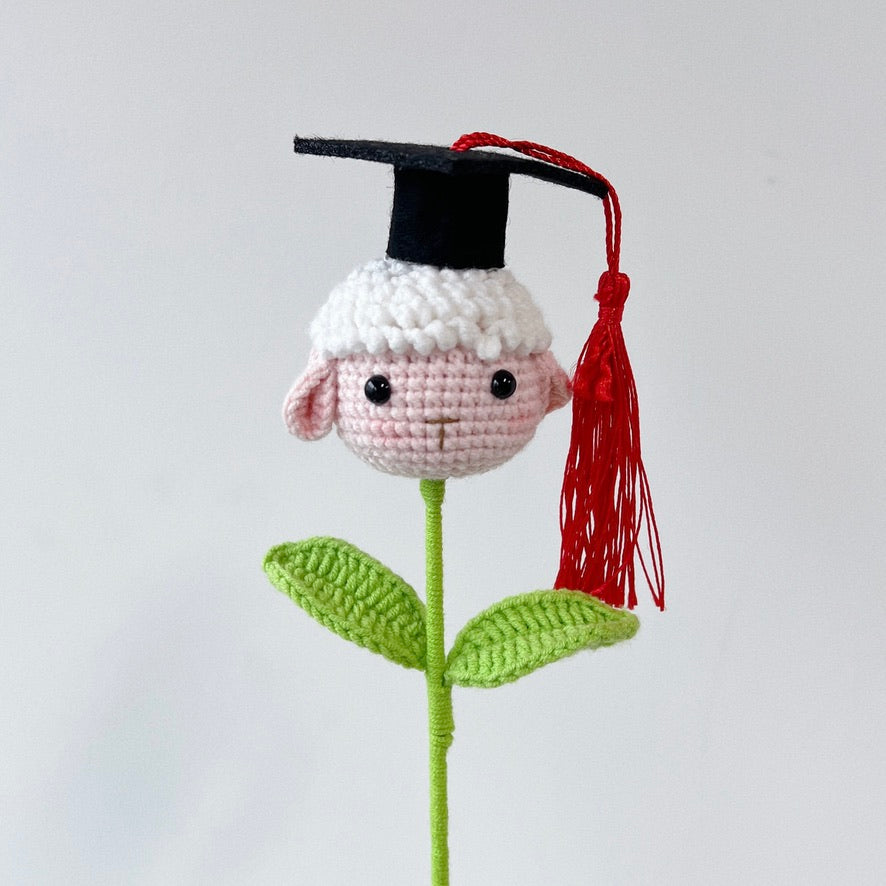 crochet cartoon character animal single stalk flower sheep with mortarboard