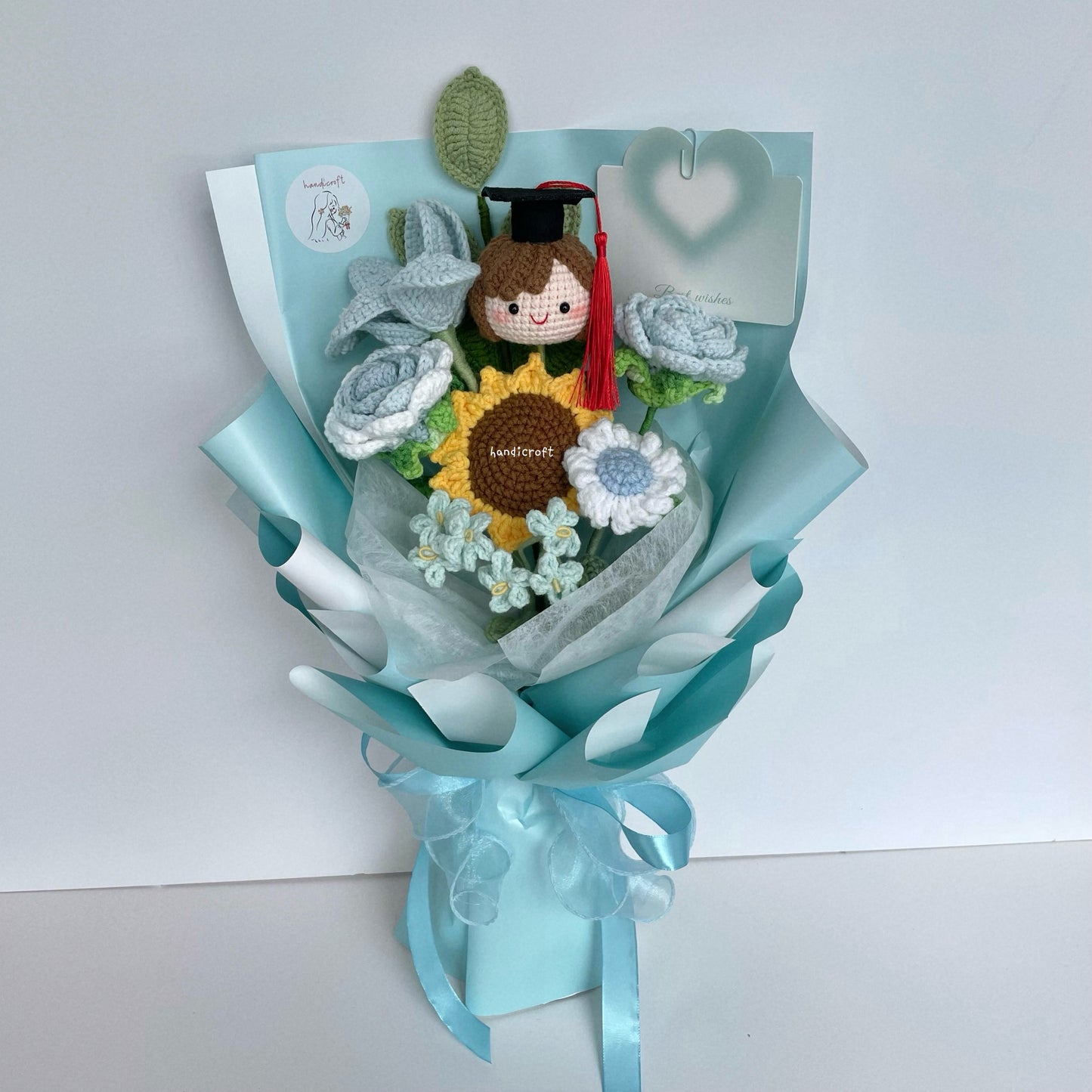 handicroft handmade crochet graduation flower bouquet happy petals light blue girl