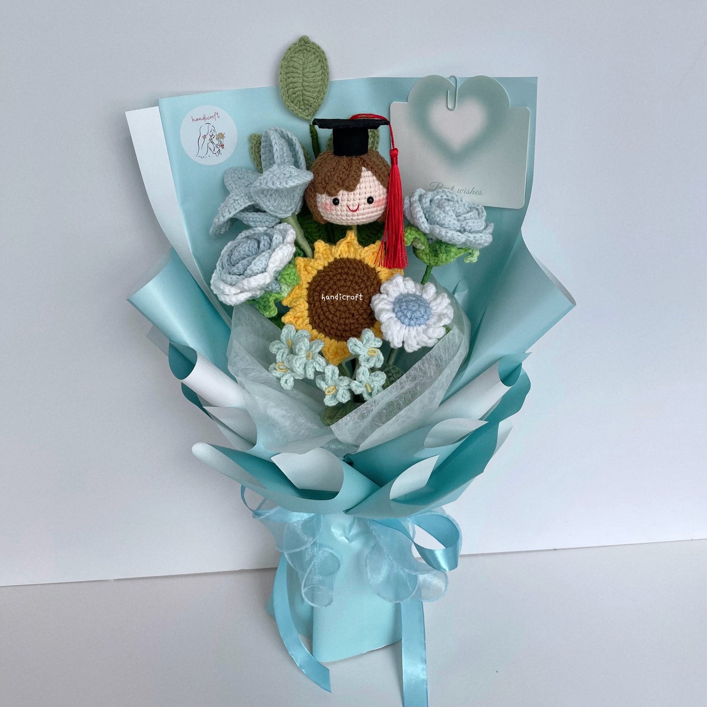 handicroft handmade crochet graduation flower bouquet happy petals light blue girl