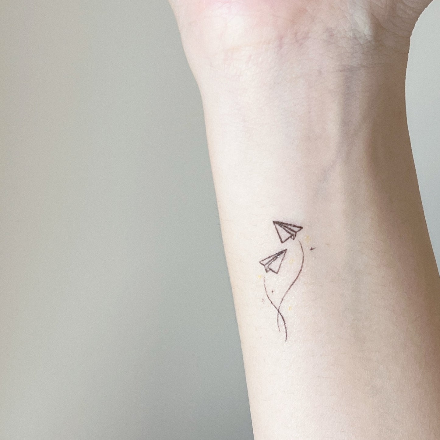 2 paper airplanes temporary tattoo sticker