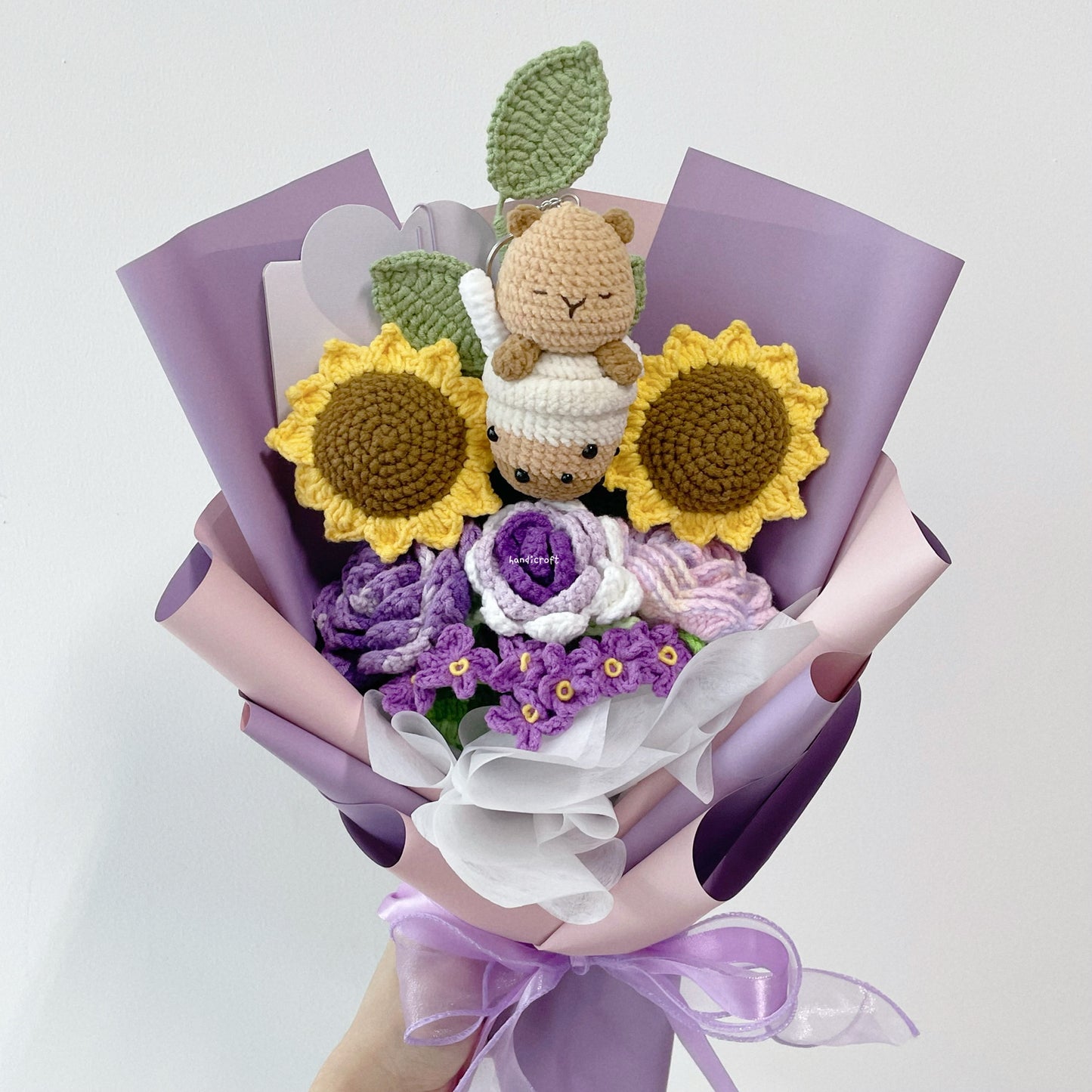 handicroft crochet flower bouquet capybara's sunshine & sips purple wrapped