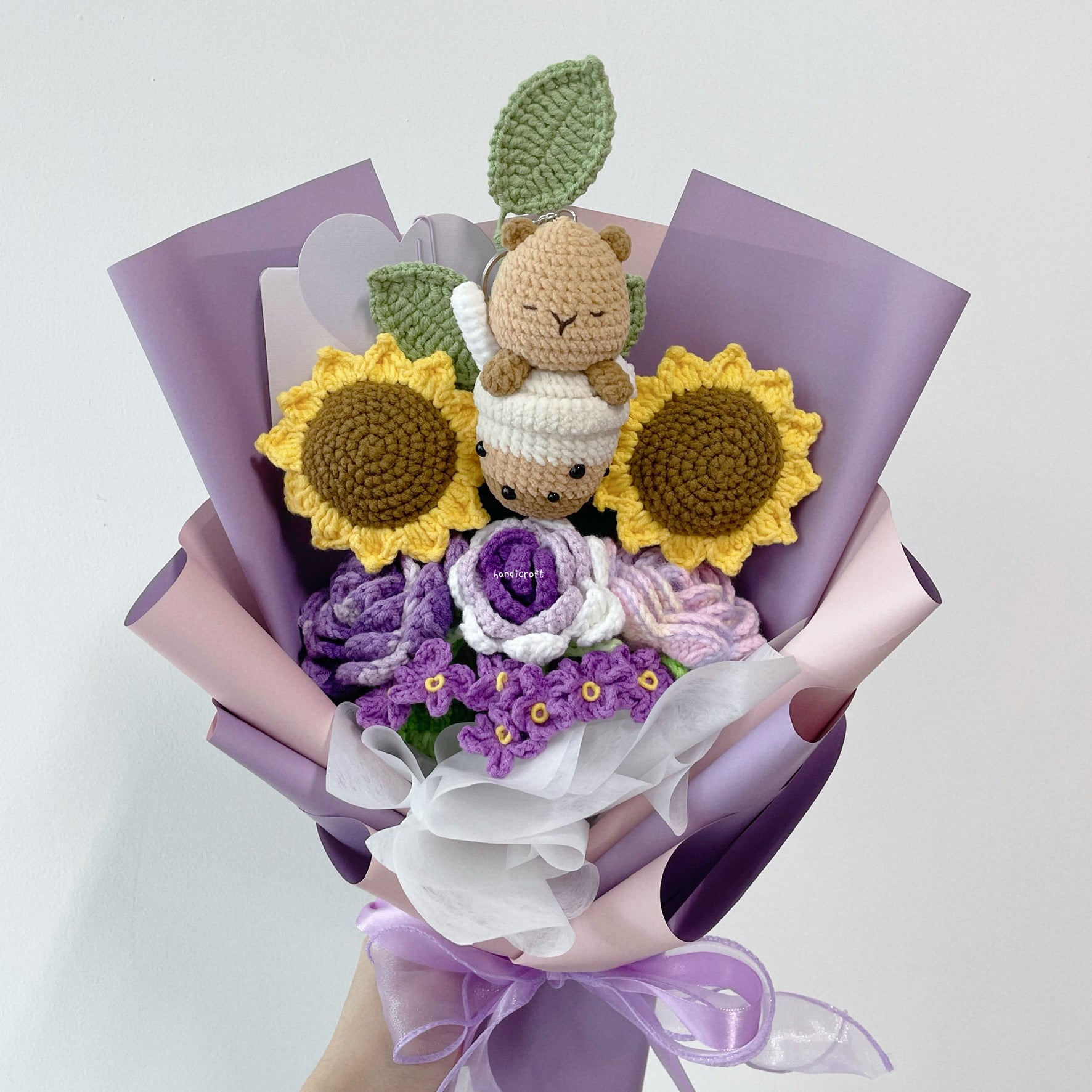 handicroft crochet flower bouquet capybara's sunshine & sips purple wrapped