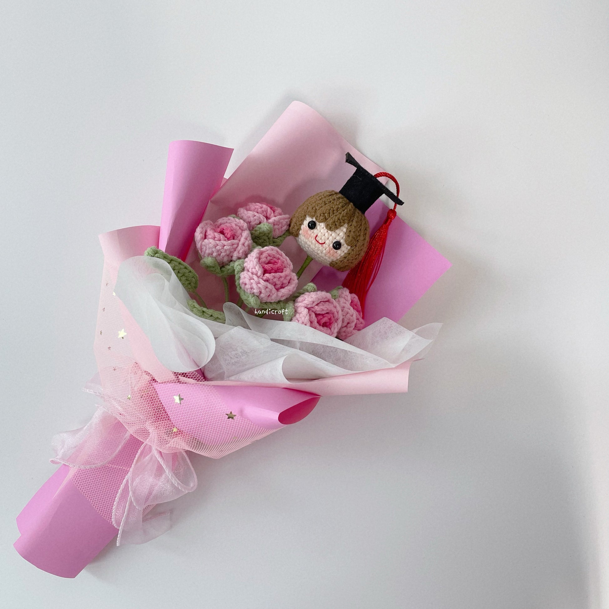 handicroft graduation flower bouquet grad & bloom girl with ombre pink flowers wrapped